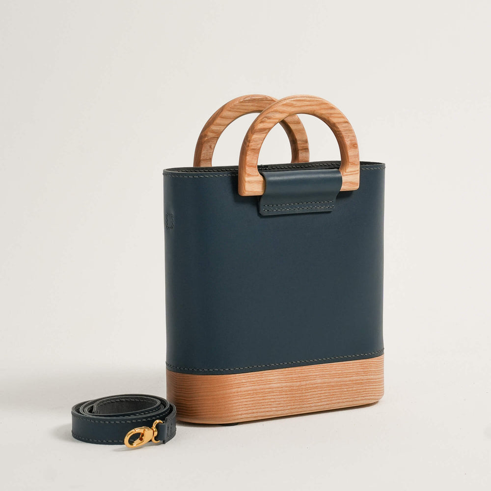 
                      
                        The Wooden Bag - Navy
                      
                    