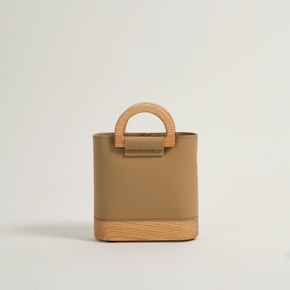 
                      
                        The Mini Wooden Bag - Sand
                      
                    