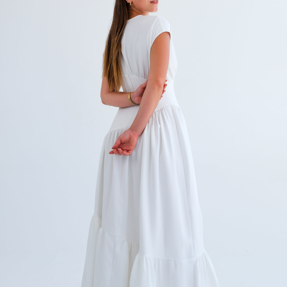 
                      
                        The Asymmetric Dress- Off-White
                      
                    