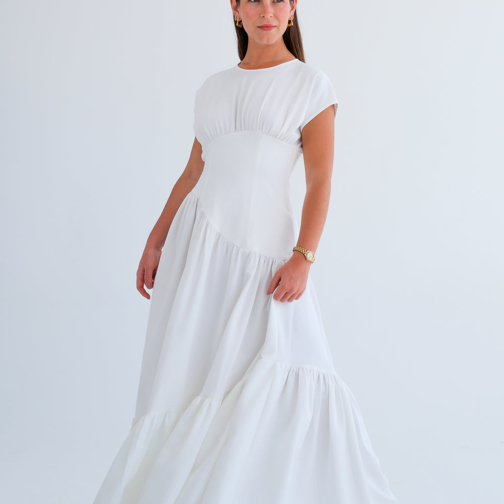 
                      
                        The Asymmetric Dress- Off-White
                      
                    