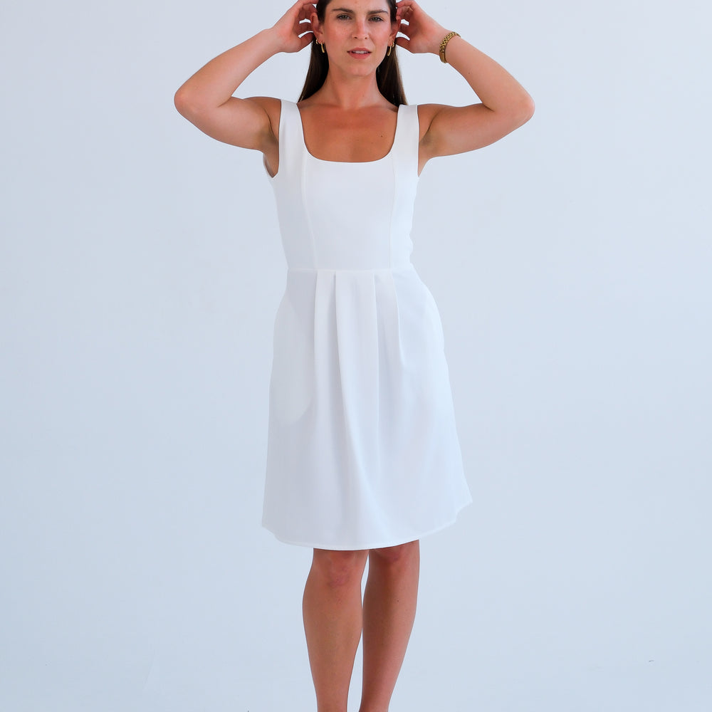 
                      
                        The Blaire Dress-Off-White
                      
                    