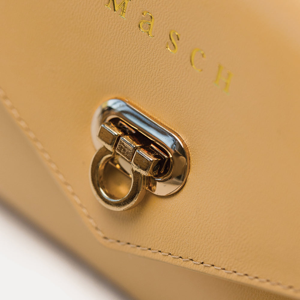 
                      
                        The Dumi Sling Bag - Desert
                      
                    