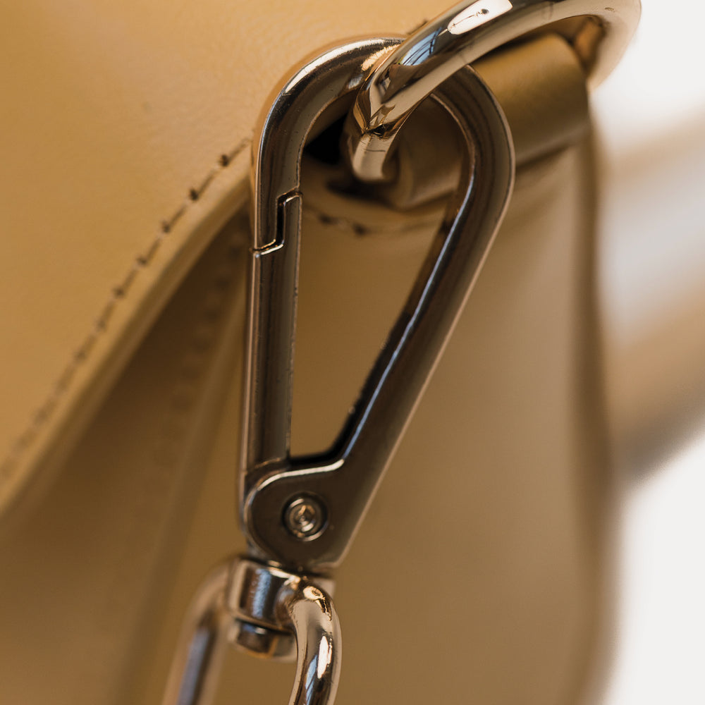 
                      
                        The Dumi Sling Bag - Desert
                      
                    
