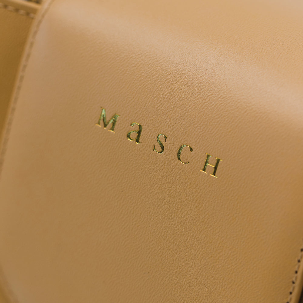 
                      
                        The Zuri Bucket Bag - Desert
                      
                    