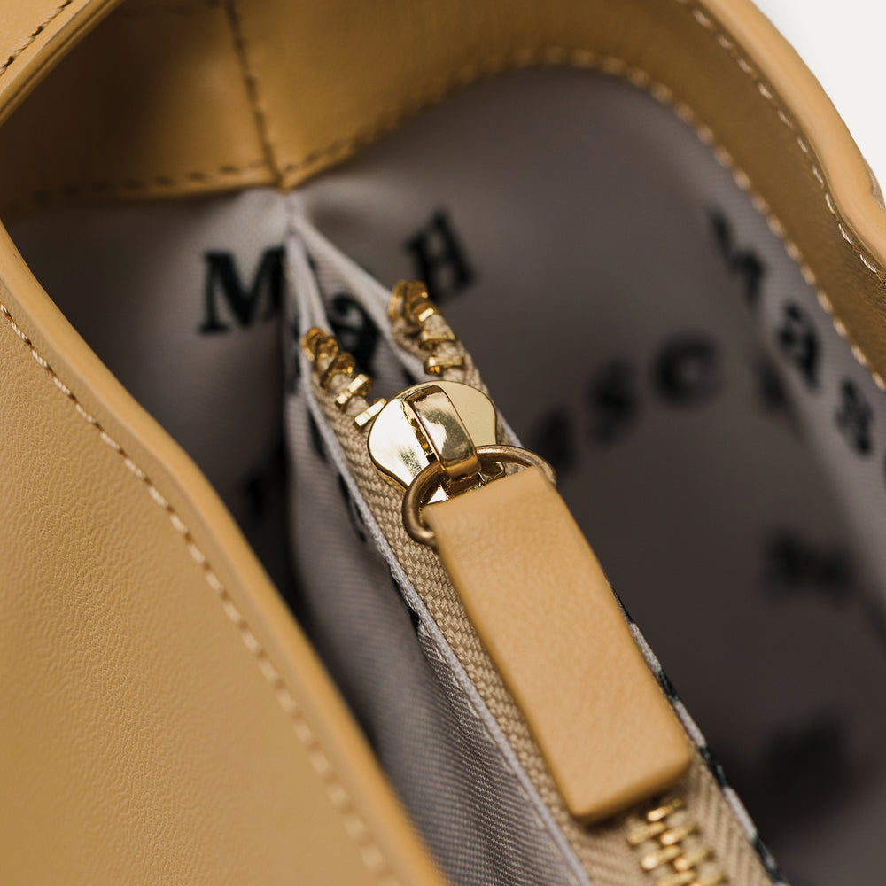 
                      
                        The Zuri Bucket Bag - Desert
                      
                    