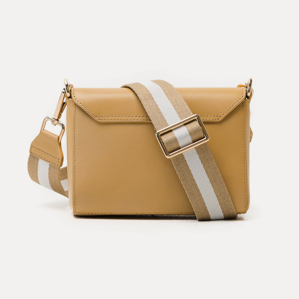 
                      
                        The Dumi Sling Bag - Desert
                      
                    