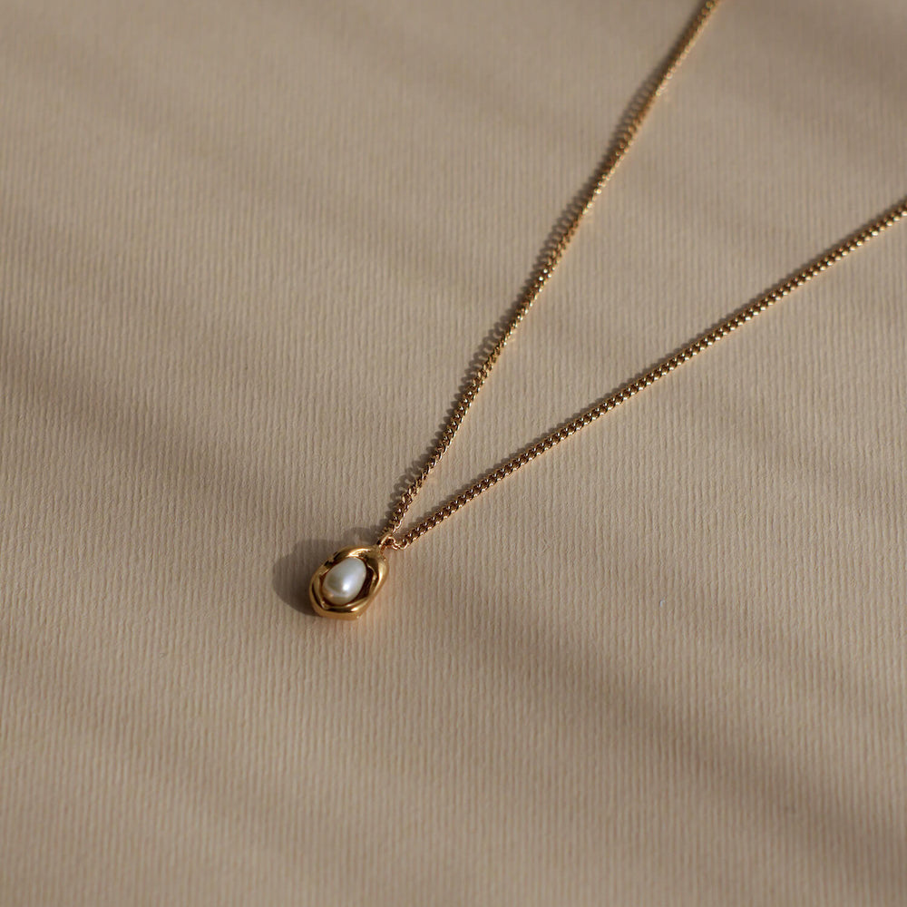 
                      
                        Delia Pearl Pendant
                      
                    